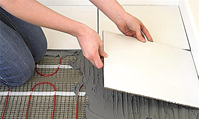Cómo hacer un piso cálido debajo del azulejo: reglas de colocación + guía de instalación