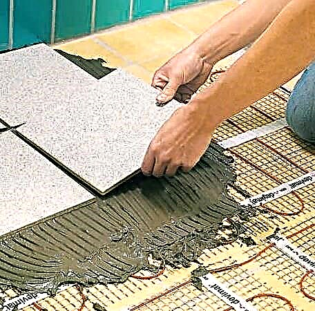 How to make an electric heated floor for tiles: film and cable option